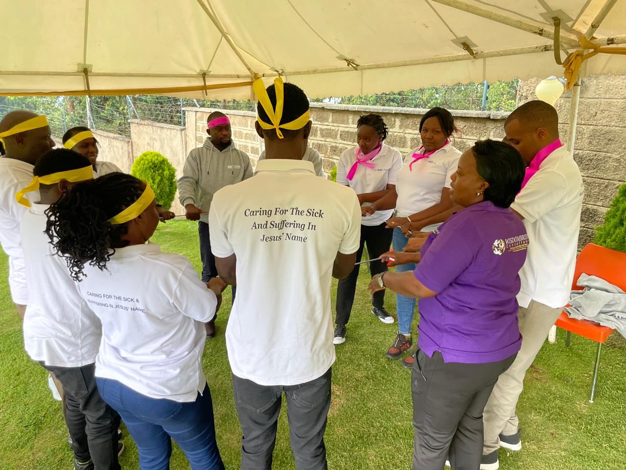 Faith Aid team in a psychosocial debriefing and team-building circle